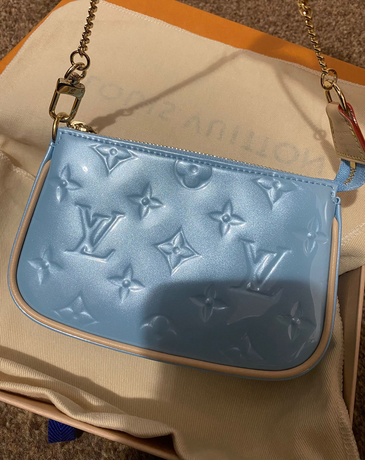 Louis Vuitton Mini Pochette Accessories Lillipop Blue in Calfskin